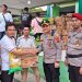 Kapolres Langkat Salurkan Bantuan Kapolri untuk Warga Terdampak Banjir di Tanjung Pura