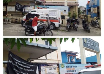 Bendera Hitam Bertuliskan “Kelurahan Terkotor” Berkibar Di Depan Kantor Lurah Tegal Sari Mandala III Kecamatan Medan Denai