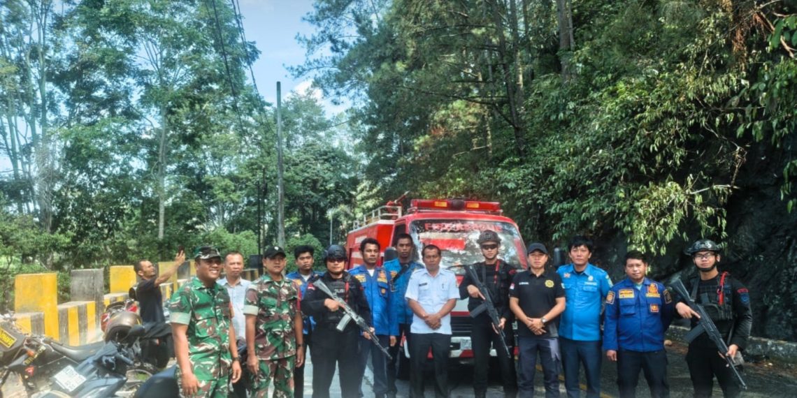 Sigap di Tengah Karhutla, Brimob Sumut Amankan Jalur Lintas Siborongborong–Parapat