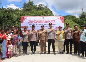 Polres Pakpak Bharat Revitalisasi Jembatan Merah Putih Di Desa Lae Langge Namuseng Kecamatan STTU Julu.