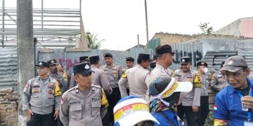 POLRES PELABUHAN BELAWAN LAKUKAN PENGAMANAN AKSI UNJUK RASA LSM GUSSUR DI LABUHAN DELI