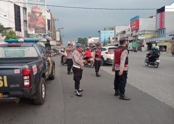 Komitmen Melayani Masyarakat, Polsek Medan Kota Ciptakan Lalu Lintas Aman dan Lancar di Jalan Sisingamangaraja Kota Medan