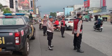 Komitmen Melayani Masyarakat, Polsek Medan Kota Ciptakan Lalu Lintas Aman dan Lancar di Jalan Sisingamangaraja Kota Medan